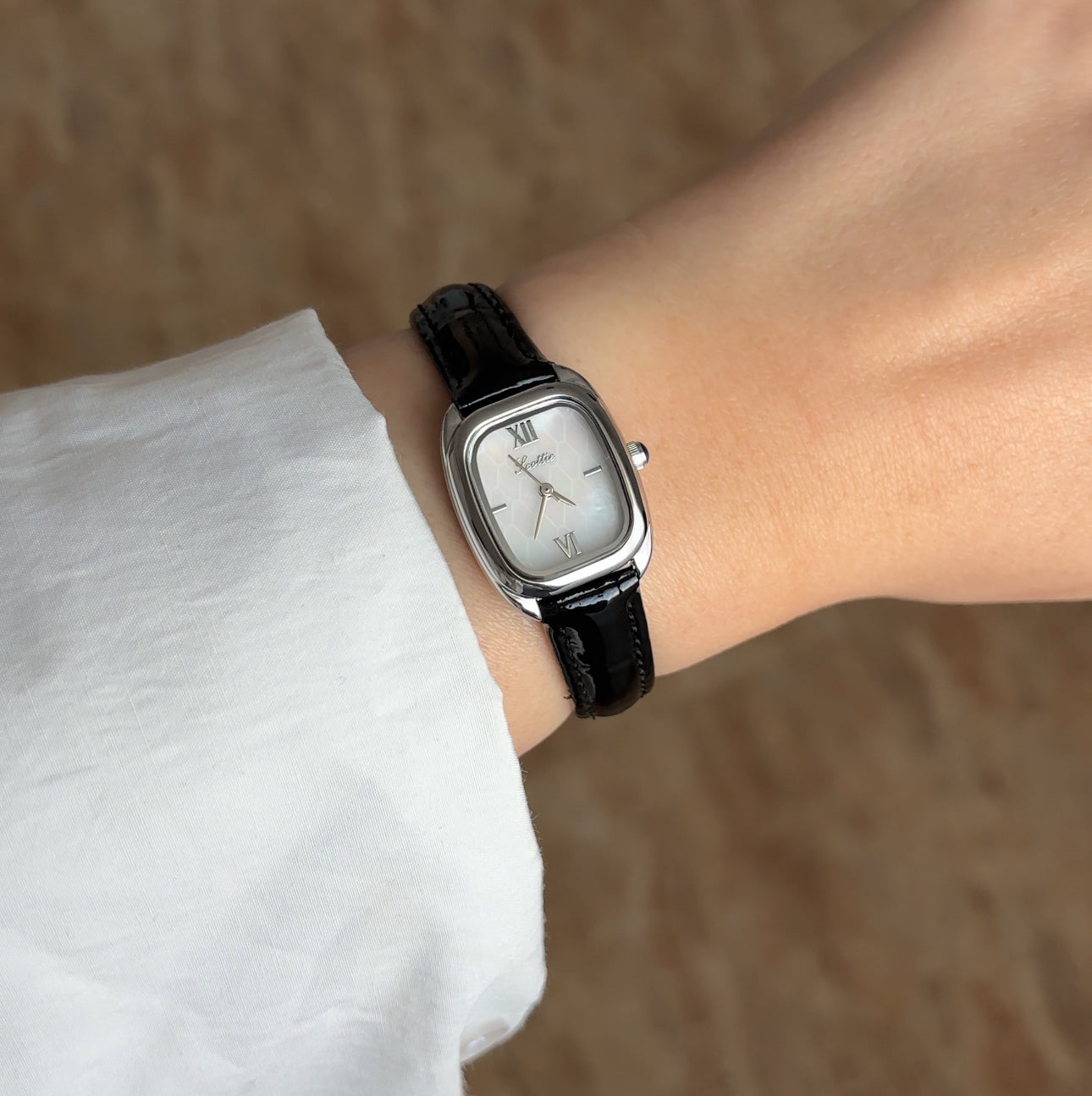 Montre femme cuir serpent noir 